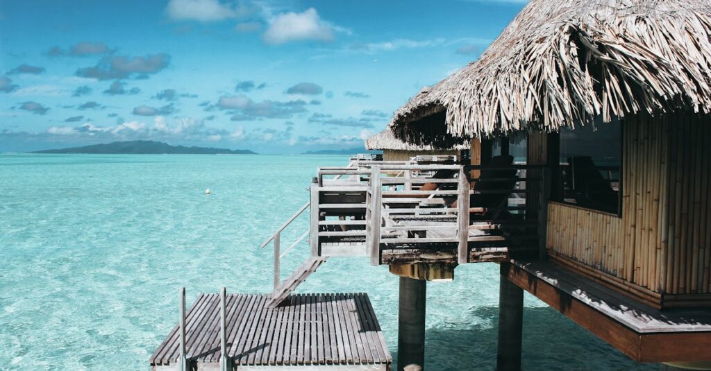 Brown Nipa Hut on Body of Water