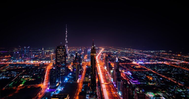 High Rise Buildings during Night Time Photo