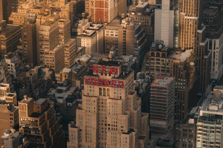 An aerial view of a city with a large building