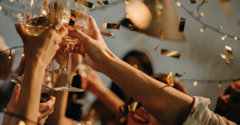 People Toasting Wine Glasses