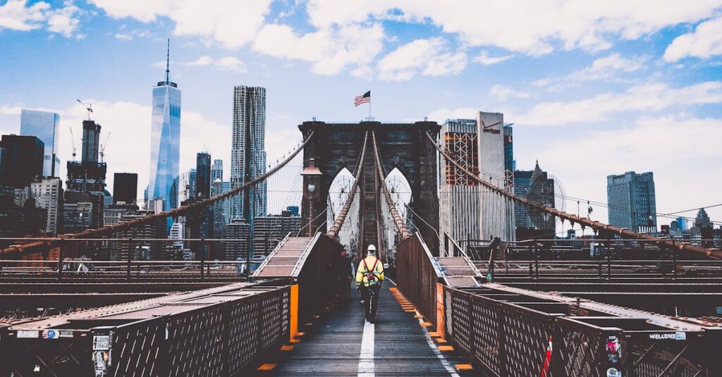 Man Walking on Bridge