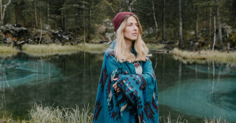 Woman in forest near lake