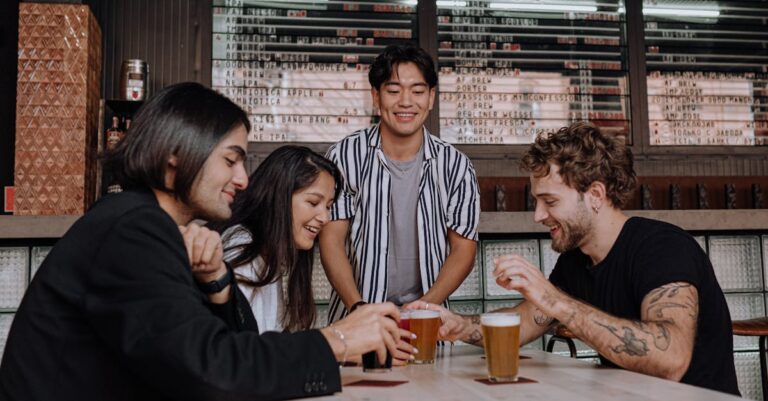 Photo of a Group of Friends Having a Drink