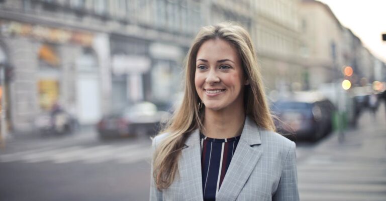 Close-up Photography of a Woman Wearing Formal Coat