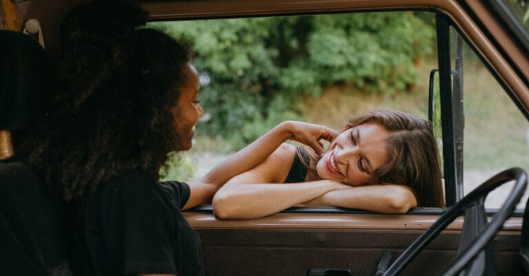 Man and Woman Kissing Inside Car